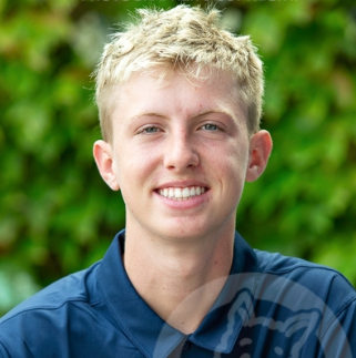 2025-03-28-11-04-Mason-Headshot-2024.png